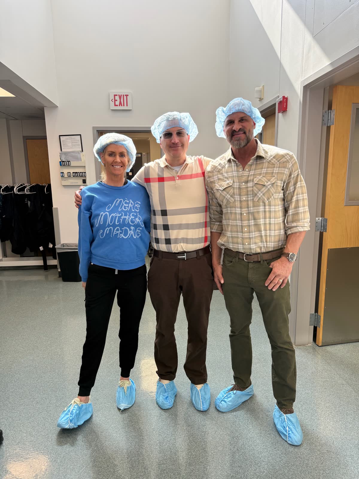 Andrew Hillman with others in a clinical setting.